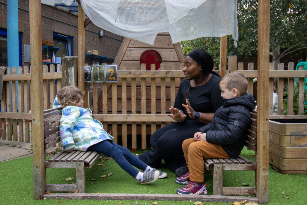Conversations outside at LEYF Playhouse Nursery