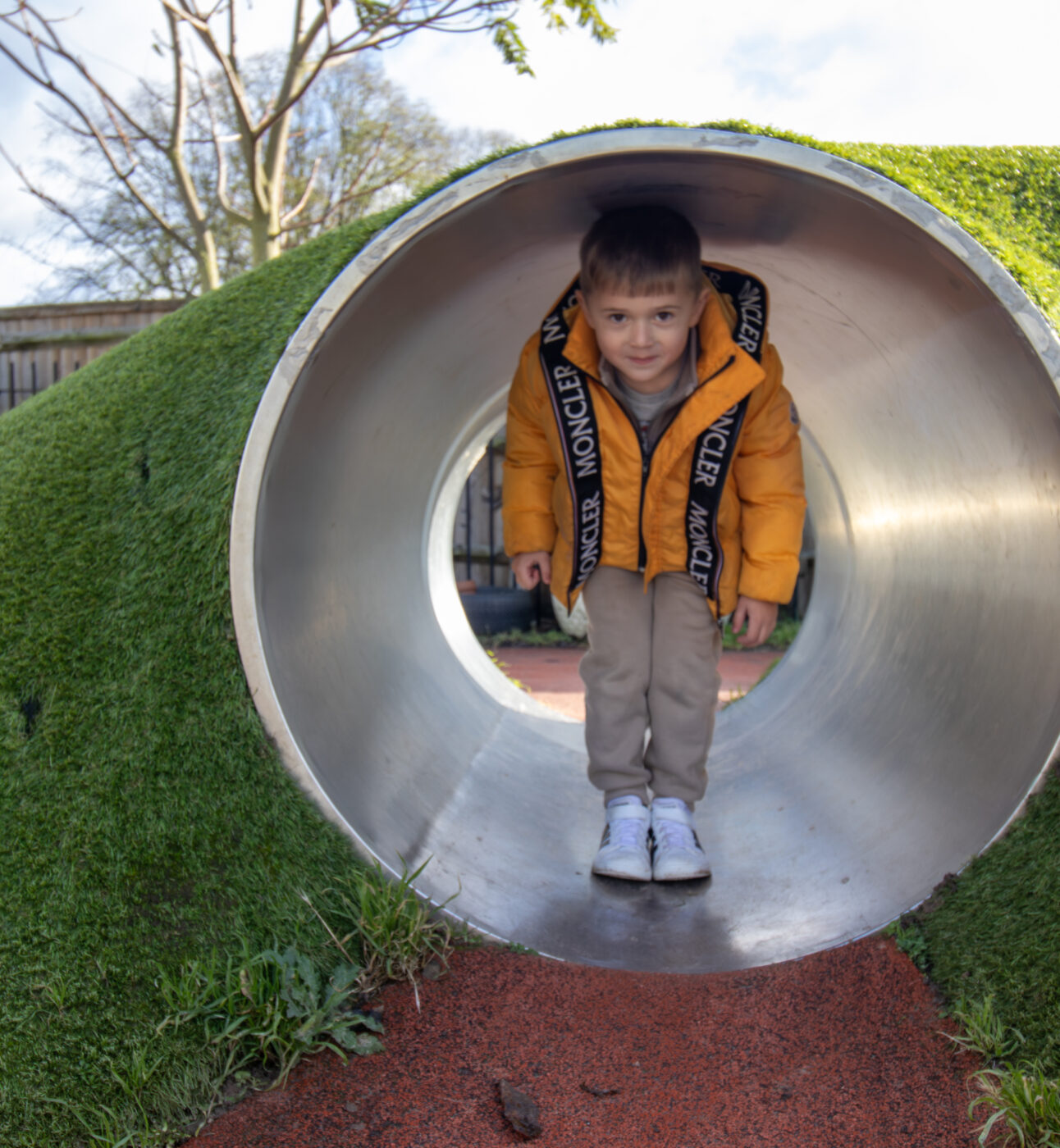Boy playing on slide